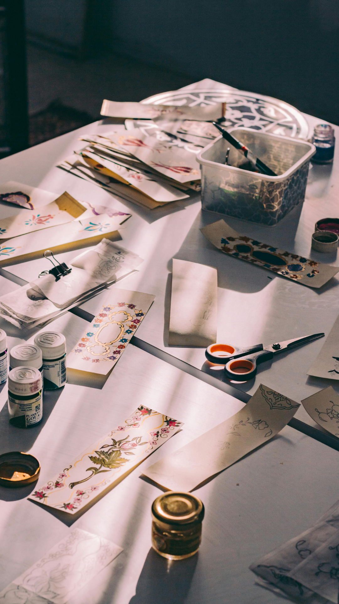 Crafting workspace with art supplies and handmade goods